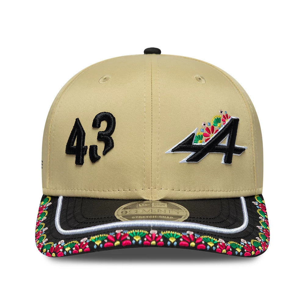 Alpine Racing Latin American Franco Colapinto Light Beige New Era 9SEVENTY Stretch Snap Adjustable Cap, front view showing black embroidered 43 and A logos on the beige crown, a black visor with intricate colourful floral embroidery.