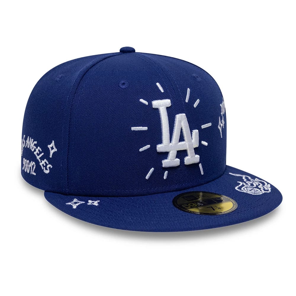 LA Dodgers MLB Scribble Dark Blue New Era 59FIFTY Fitted Cap, three-quarter view showing raised white LA logo with sunburst embroidery on front panel, matching dark blue structured crown and visor, and gold 59FIFTY size sticker on the visor.