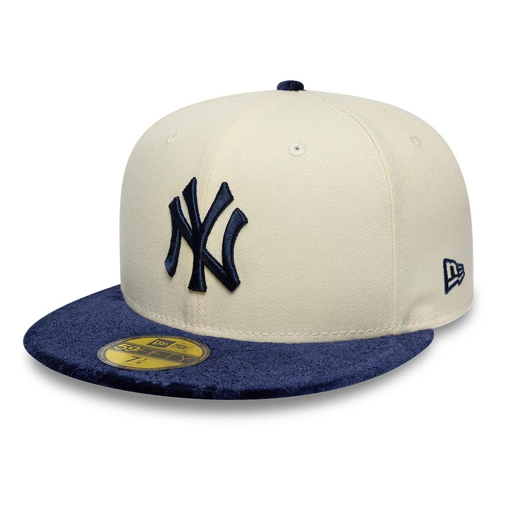 New York Yankees MLB Paisley Visor Cream New Era 59FIFTY Fitted Cap, front view showing the large navy blue embroidered NY logo on the cream front panels, with a distinctive dark blue paisley pattern on the flat visor.