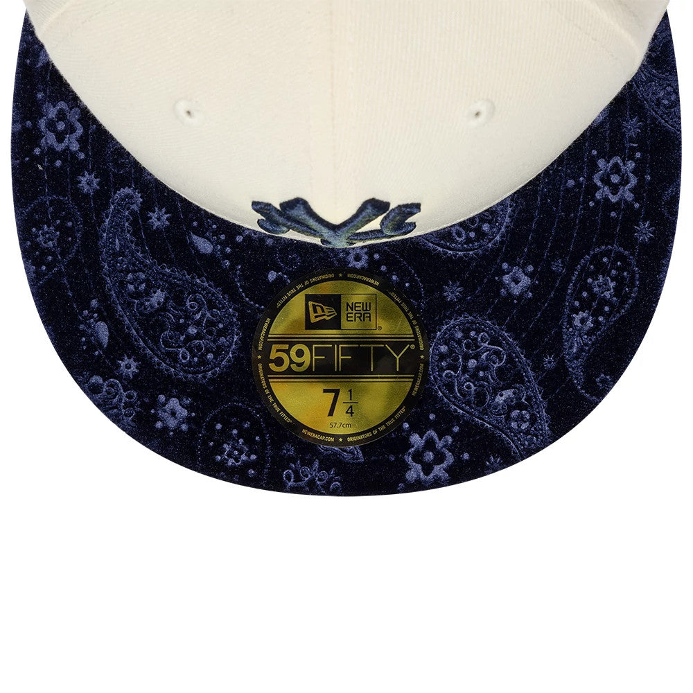 New York Yankees MLB Paisley Visor Cream New Era 59FIFTY Fitted Cap, front view showing a dark blue paisley patterned visor with a gold 59FIFTY size sticker, cream structured crown, and raised dark blue Yankees logo embroidery on the front panel.