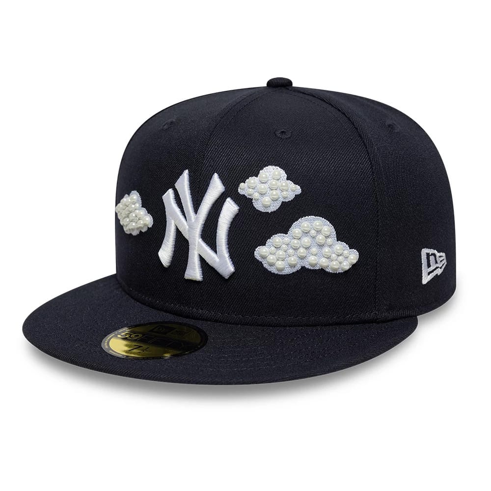 Pictured is this MLB Faux Pearl New York Yankees 59FIFTY Fitted cap in navy. 1
