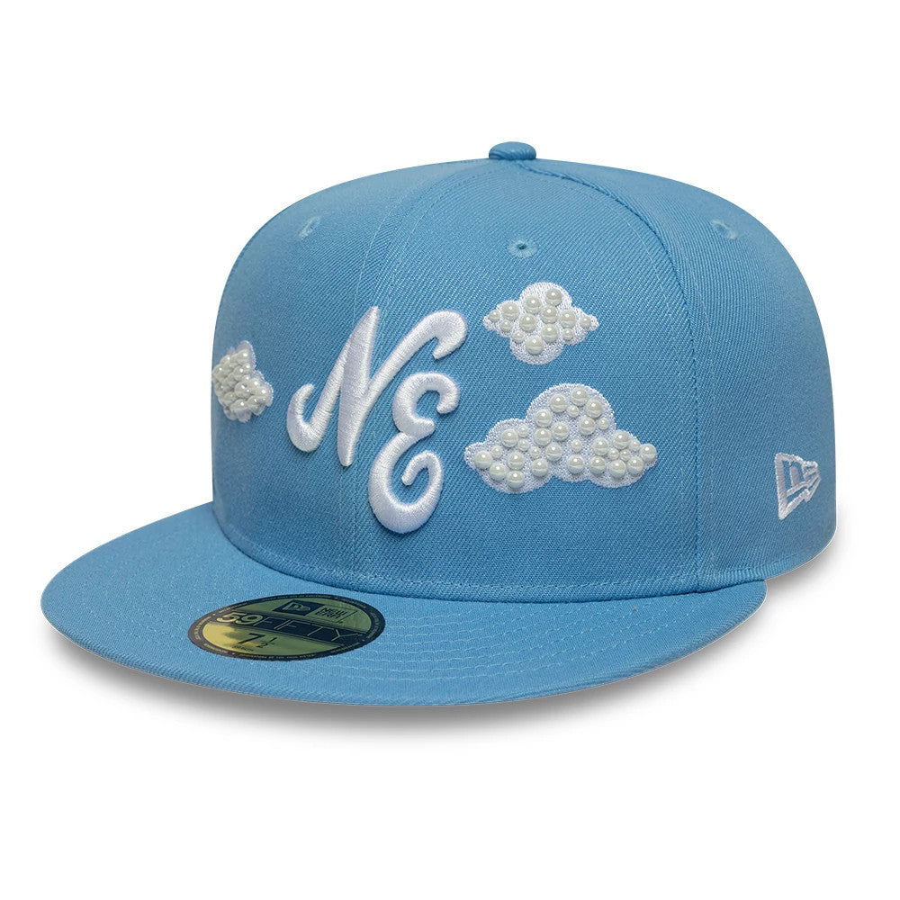 Pictured is this New Era Faux Pearl 59FIFTY Fitted cap in pastel blue. 1