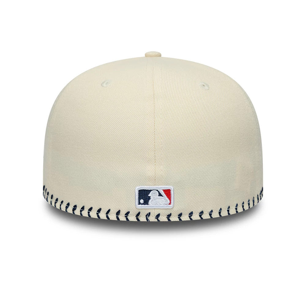 New York Yankees MLB Baseball Stitch Cream Retro Crown New Era 59FIFTY Fitted Cap, rear view showing the MLB Batterman logo embroidered at the centre back of the cream crown, with distinctive navy baseball stitch around the base.