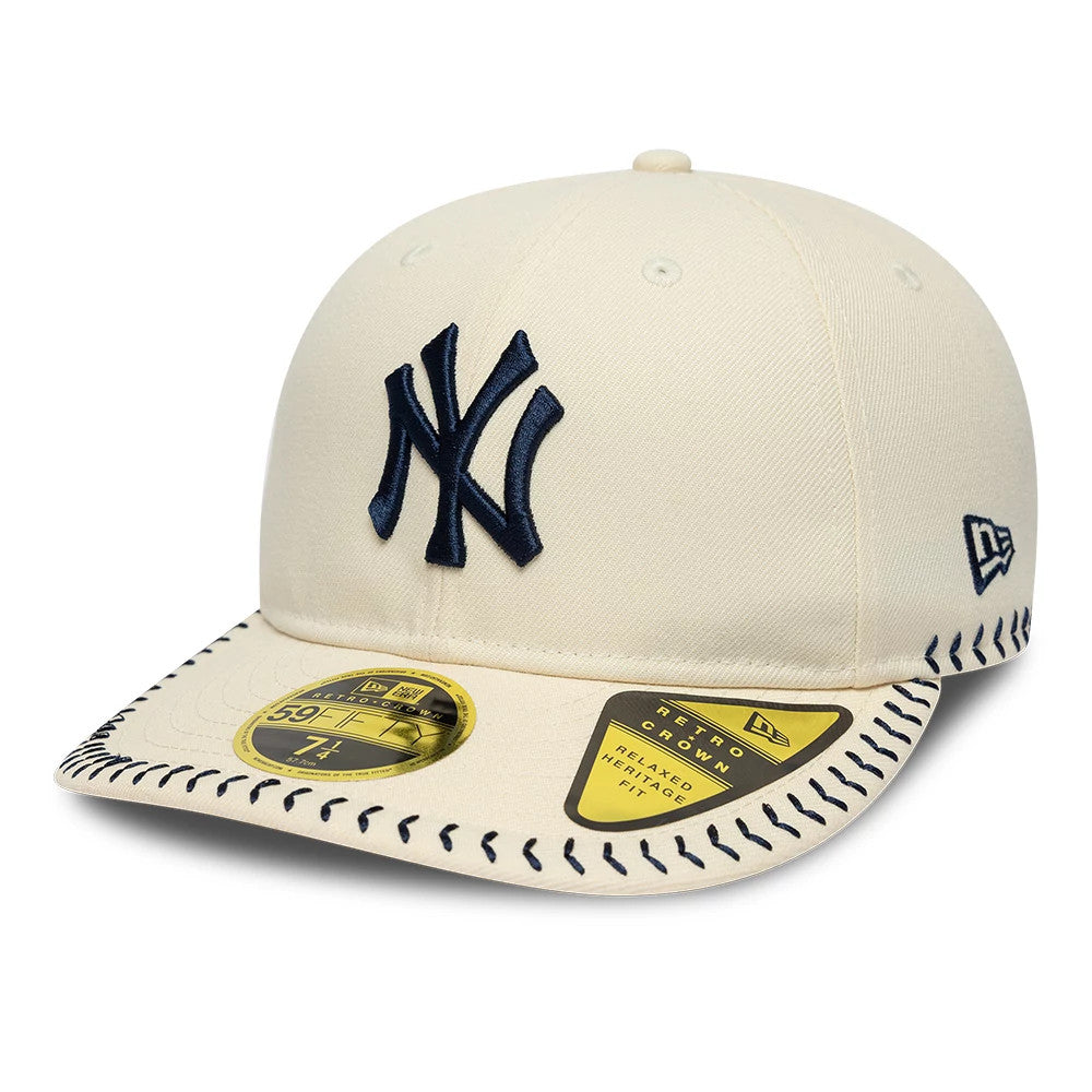 New York Yankees MLB Baseball Stitch Cream Retro Crown New Era 59FIFTY Fitted Cap, front view showing the navy embroidered NY logo on the cream crown, cream visor with navy stitching detail, and the gold 59FIFTY size sticker.