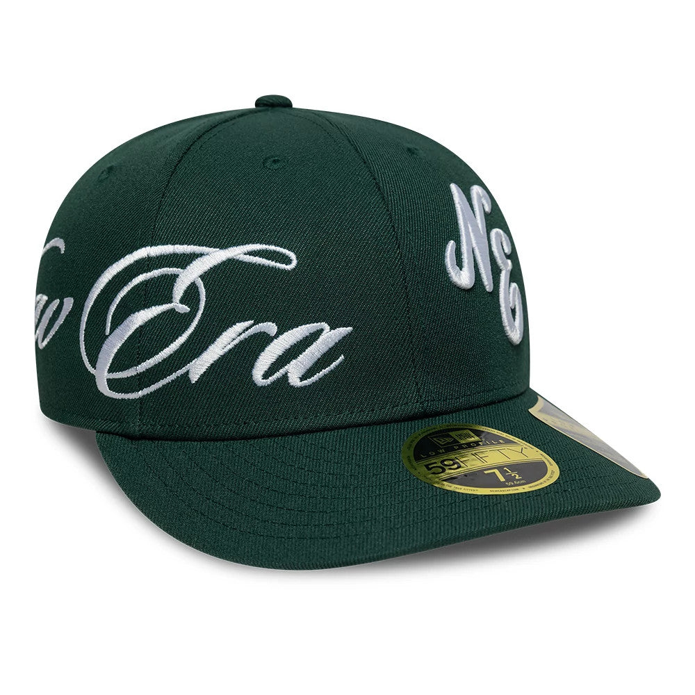 Pictured is this New Era Side Script Low Profile 59FIFTY Fitted cap in dark green. 1