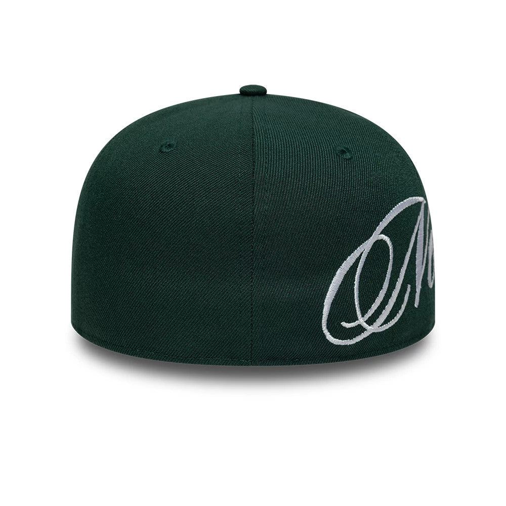 New Era Side Script Dark Green Low Profile 59FIFTY Fitted Cap, rear view showing the structured dark green crown, with eyelets and a white side script partially on the right side of the cap.