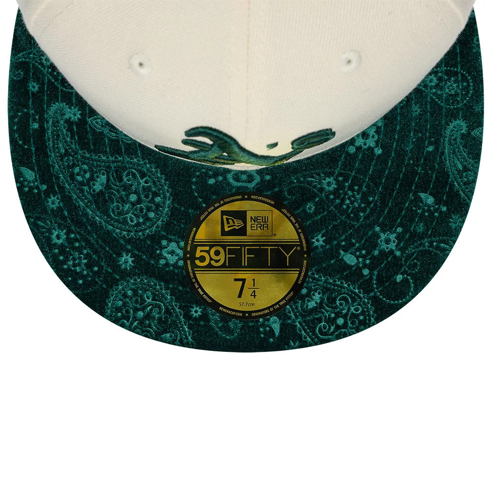 Athletics MLB Paisley Visor Cream New Era 59FIFTY Fitted Cap, front view showing the intricate green paisley pattern on the flat visor, a view of the cream front panels, and the gold 59FIFTY size sticker centrally placed on the visor.