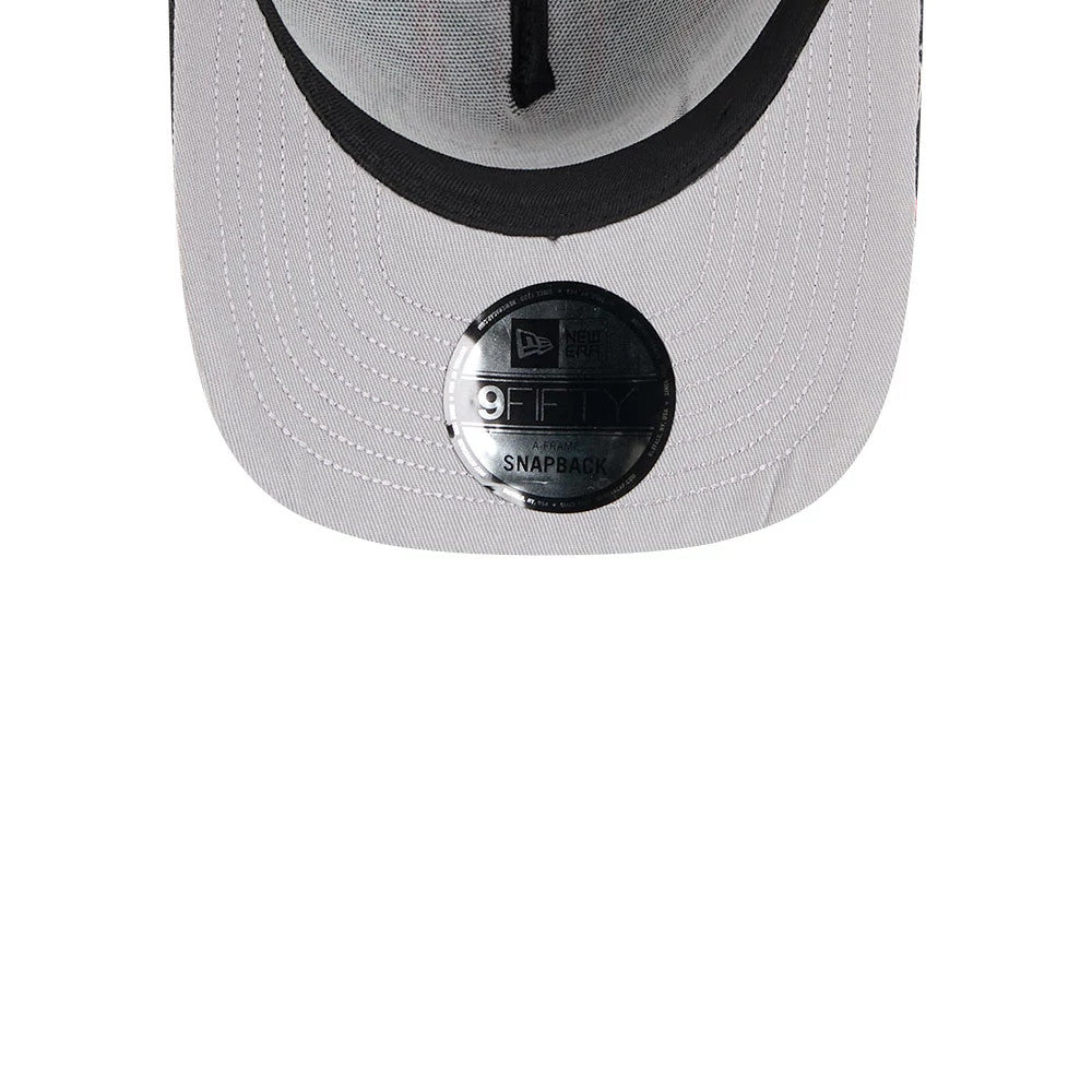 Chicago Bulls NBA Shattered Black New Era 9FORTY A-Frame Adjustable Cap, inside view showing the light grey sweatband with black taping, curved black undervisor, and a black 9FORTY size sticker on the centre of the visor.