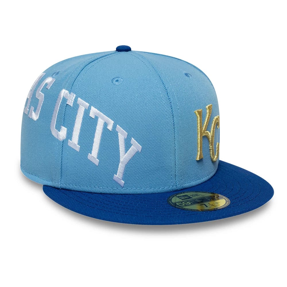 Pictured is this MLB Multi Logo Kansas City Royals 59FIFTY Fitted cap in pastel blue. 1