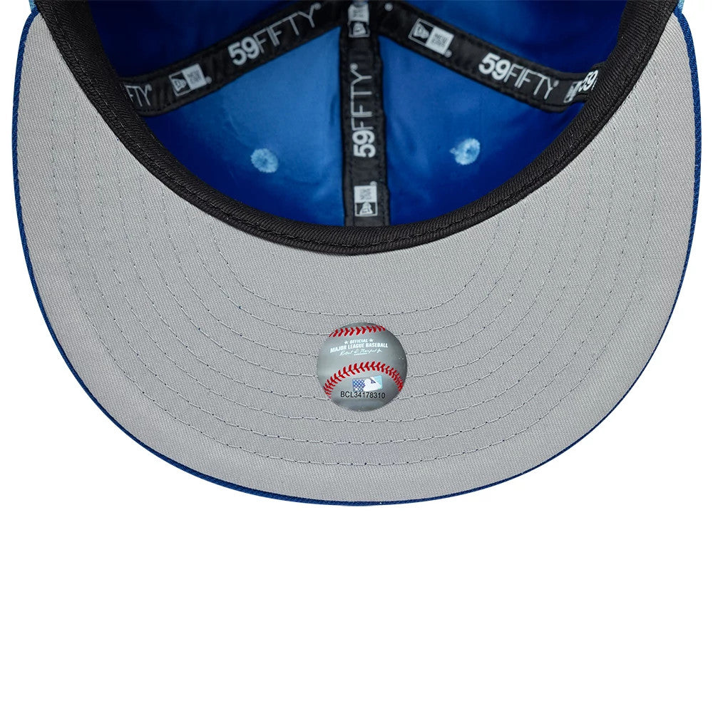 Pictured is this MLB Multi Logo Kansas City Royals 59FIFTY Fitted cap in pastel blue. 8