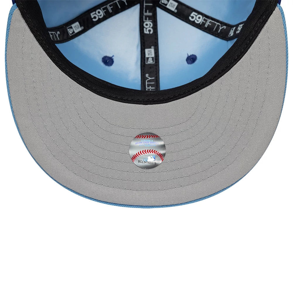 Pictured is this MLB Multi Logo Texas Rangers 59FIFTY Fitted cap in dark blue. 8