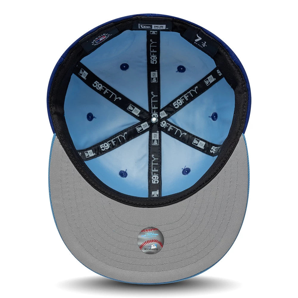 Texas Rangers MLB Multi Logo Satin Lined Dark Blue New Era 59FIFTY Fitted Cap, inside view showing the blue satin lining, black 59FIFTY branded taping, grey undervisor, and embroidered baseball graphic at the centre of the visor.