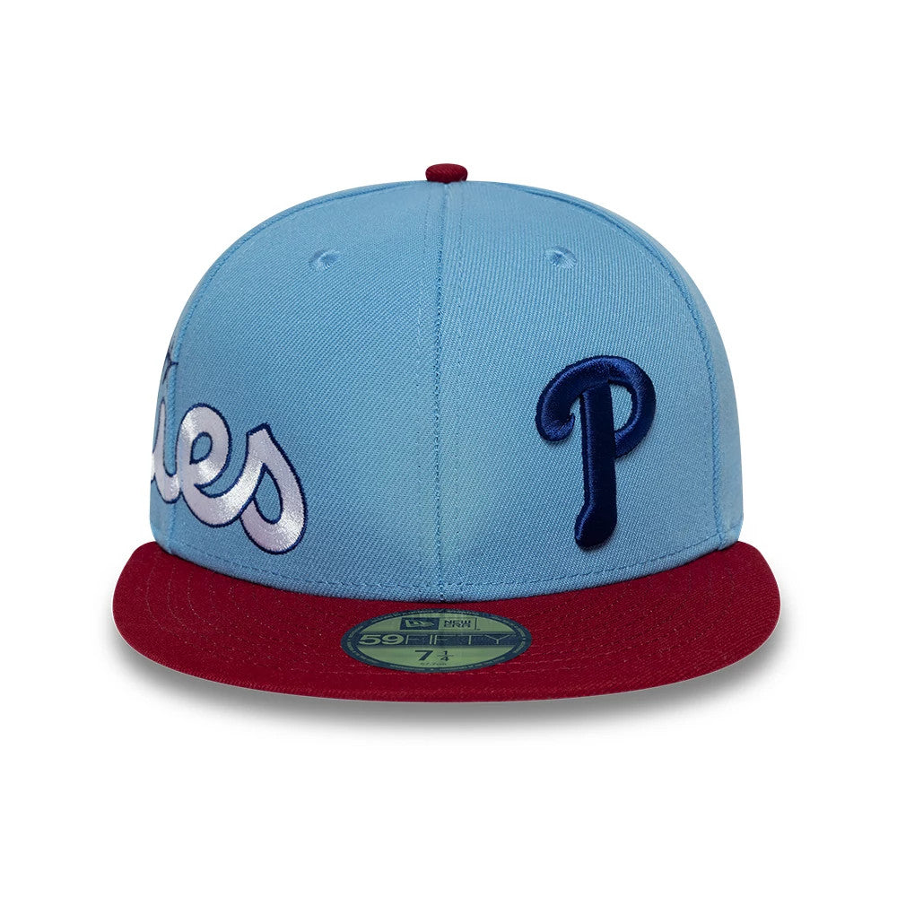 Philadelphia Phillies MLB Multi Logo Satin Lined Pastel Blue New Era 59FIFTY Fitted Cap, front view showing the dark blue raised P embroidery on the right front panel, cursive Phillies lettering across the left panels.