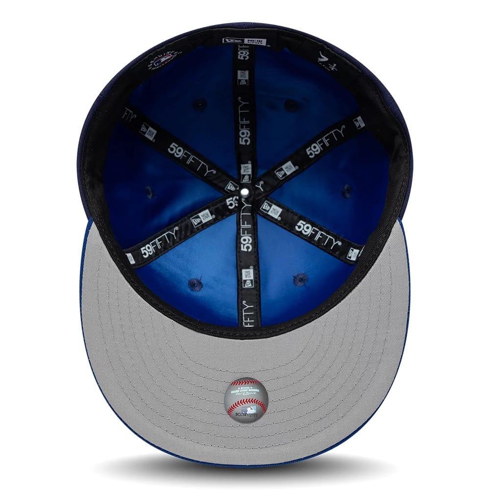 Pictured is this MLB Multi Logo Toronto Blue Jays 59FIFTY Fitted cap in navy. 2