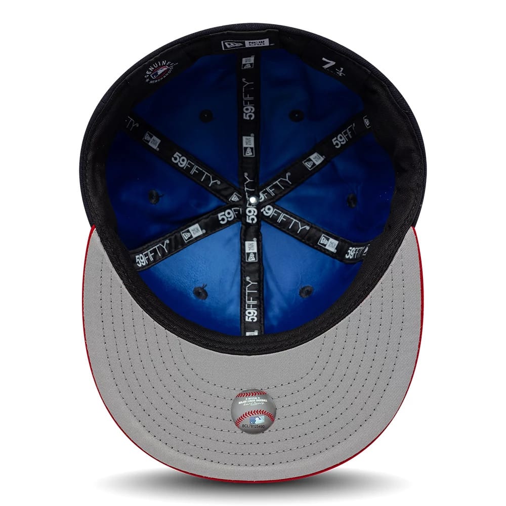 Pictured is this MLB Multi Logo Atlanta Braves 59FIFTY Fitted cap in navy. 2