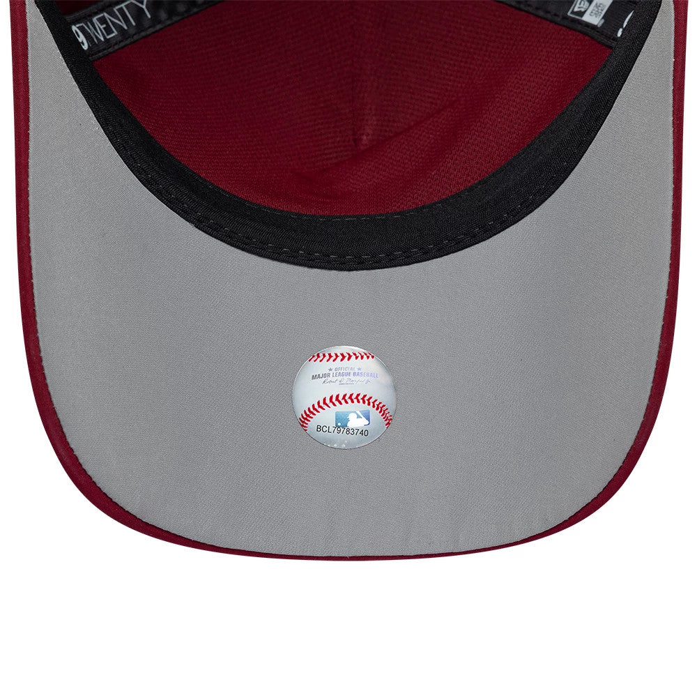 Philadelphia Phillies MLB Panel Dark Red New Era 9TWENTY A-Frame Adjustable Cap, inside view showing the grey undervisor with MLB sticker, red fabric lining, and black sweatband, with New Era taping around the crown's interior.