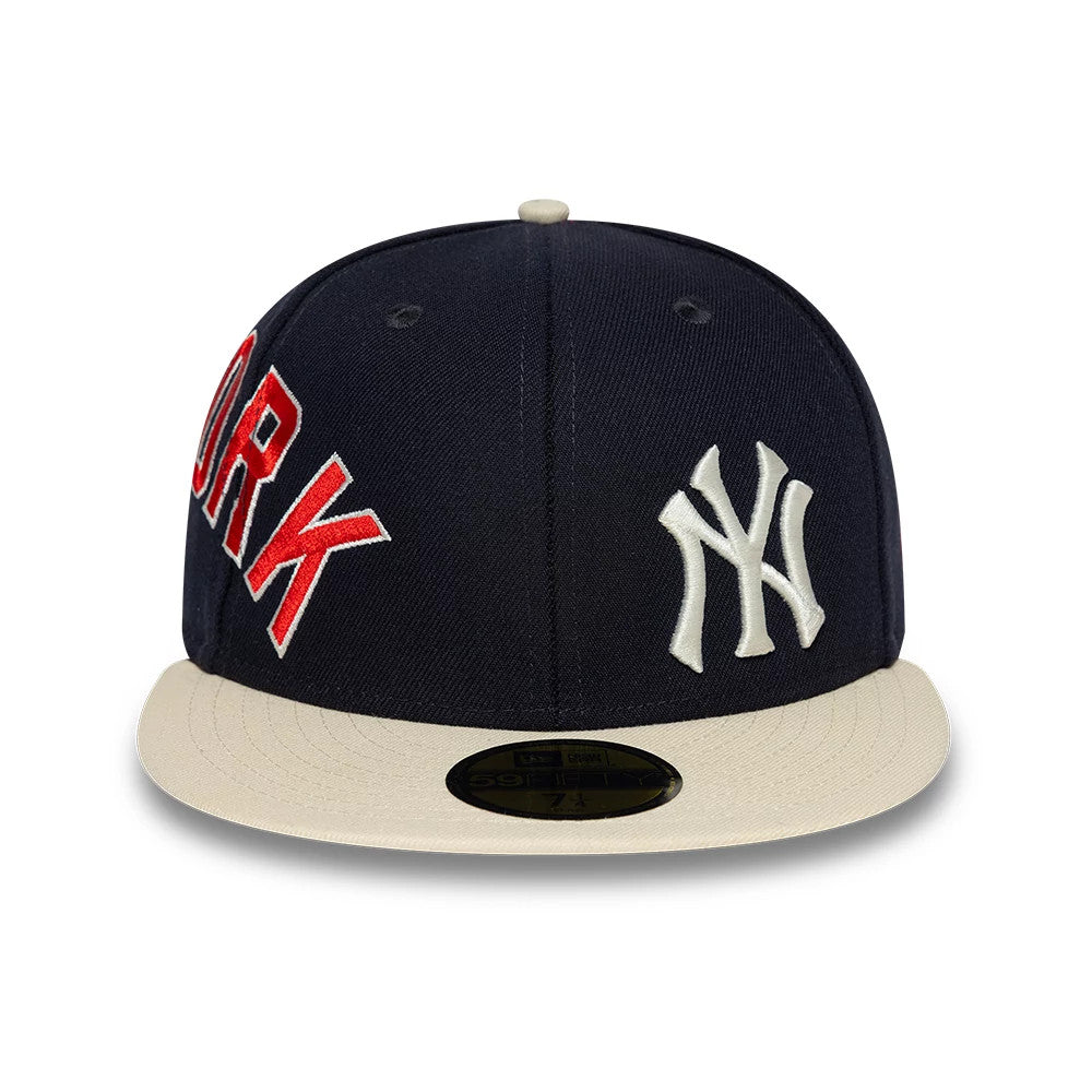 New York Yankees MLB Multi Logo Satin Lined Navy New Era 59FIFTY Fitted Cap, front view showing raised white NY logo embroidery on the front panel, red 'ORK' letters on the side, contrasting cream flat visor and gold 59FIFTY size sticker.