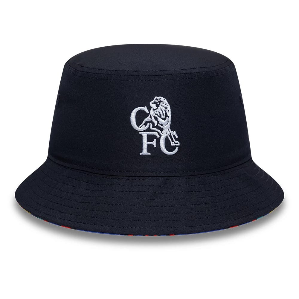New Era Chelsea FC Retro Goal Keeper Navy Reversible Bucket Hat, front view showing the white embroidered CFC lion logo on the structured navy crown, with stitching on the visor and decorative eyelets on the sides.