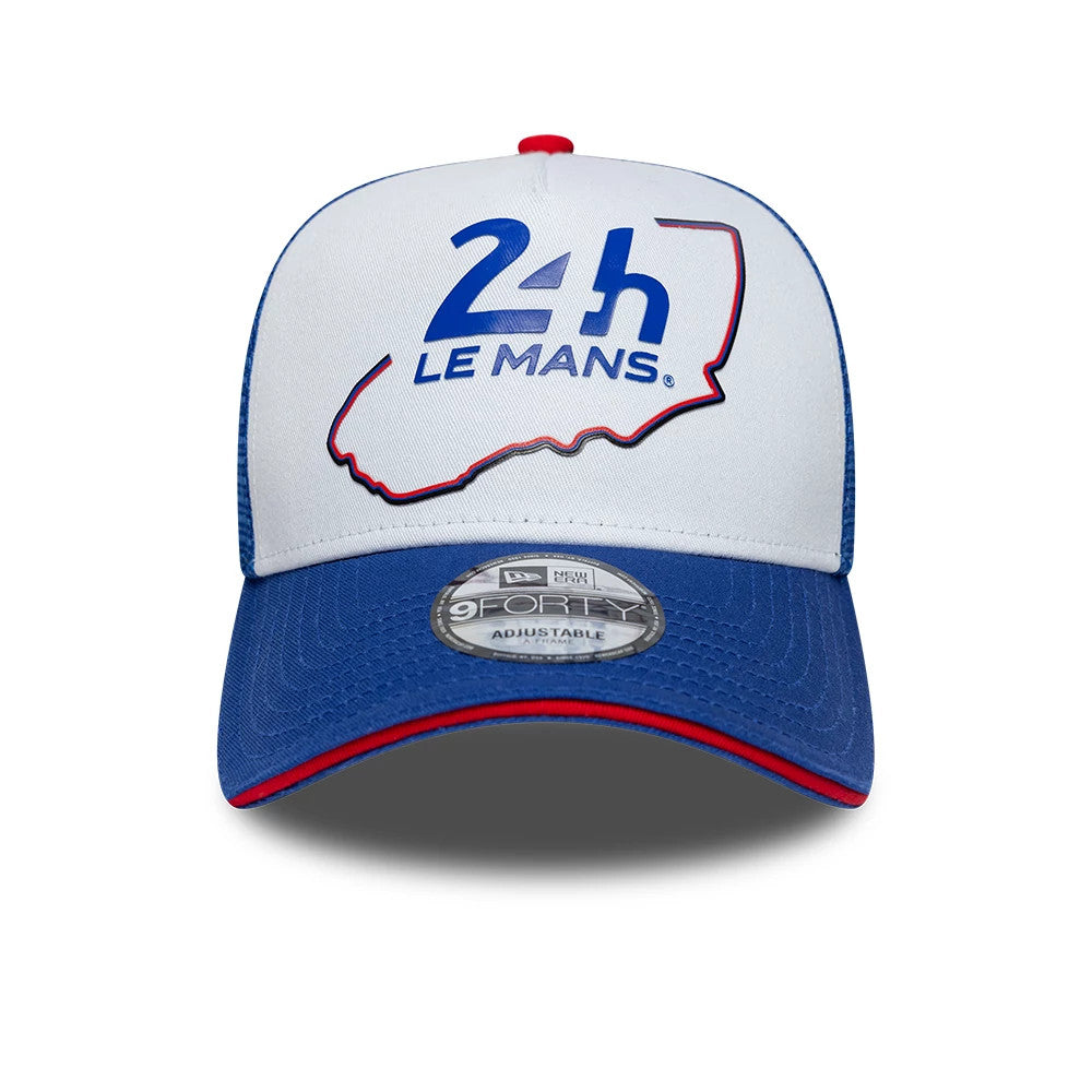 24HR Le Mans Track Blue New Era 9FORTY A-Frame Trucker Adjustable Cap, front view showing the raised blue and red Le Mans logo embroidered on the white front panel, with a blue visor and a 9FORTY size sticker on top.
