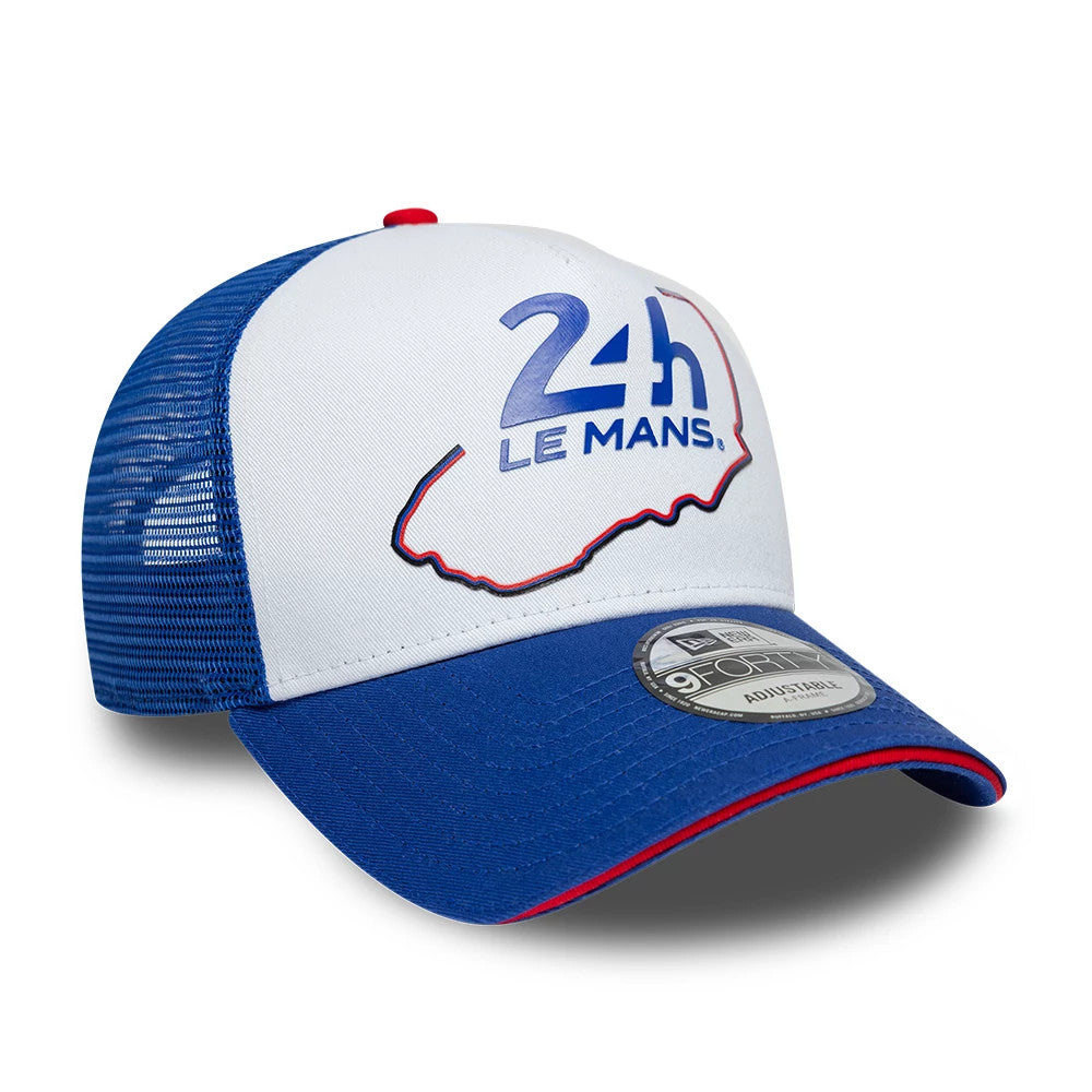 24HR Le Mans Track Blue New Era 9FORTY A-Frame Trucker Adjustable Cap, three-quarter view showing raised blue and red 24H Le Mans embroidery on the front white panel, blue curved visor with red piping, and 9FORTY size sticker.