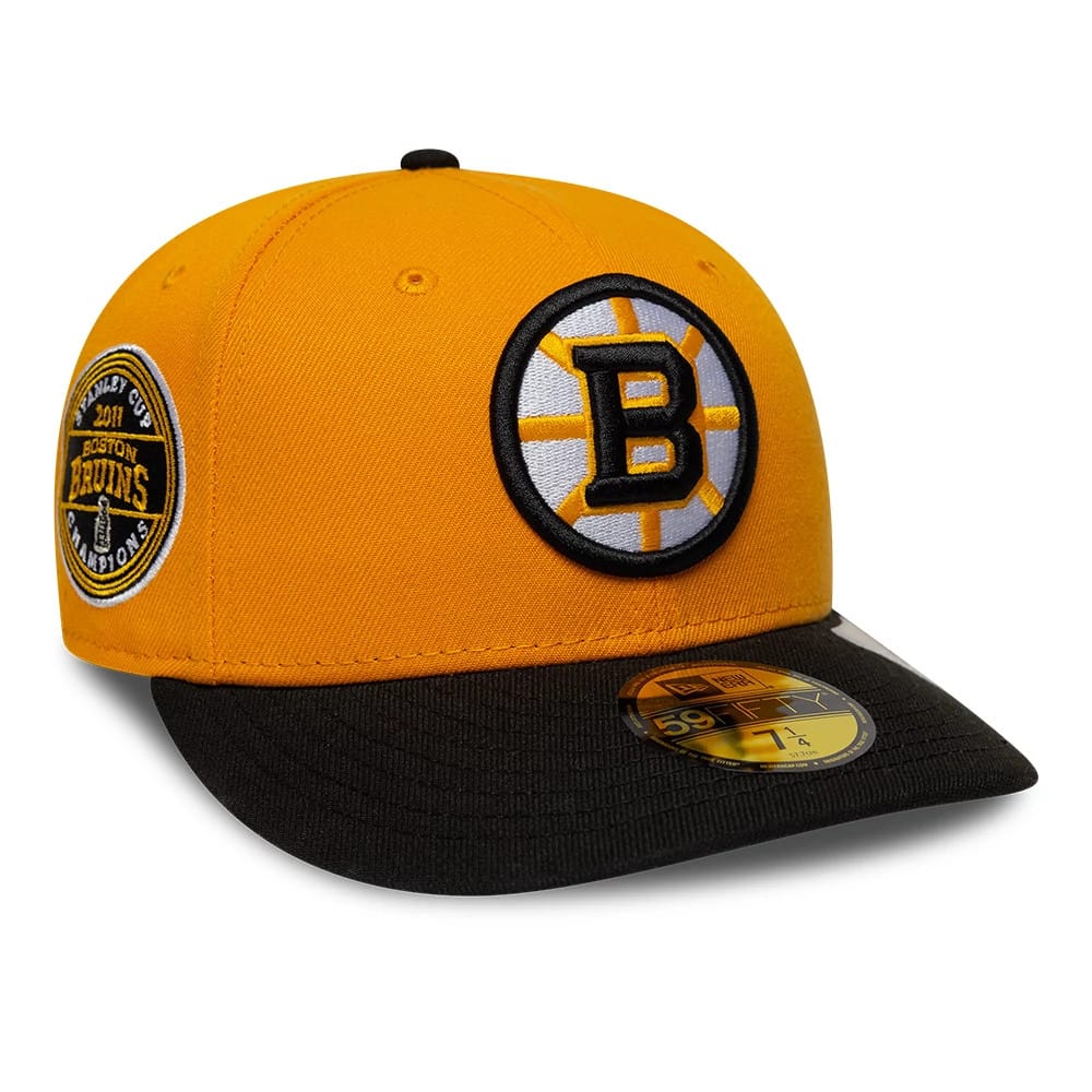 Pictured is this NHL Champions Boston Bruins 59FIFTY Fitted cap in orange. 1