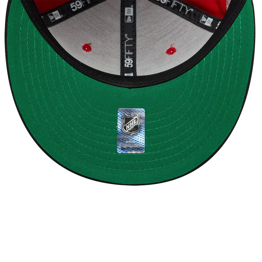 Pictured is this NHL Champions Chicago Blackhawks 59FIFTY Fitted cap in black. 2