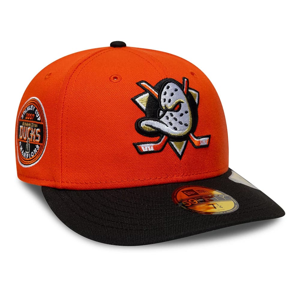 Pictured is this NHL Champions Anaheim Ducks 59FIFTY Fitted cap in orange. 1
