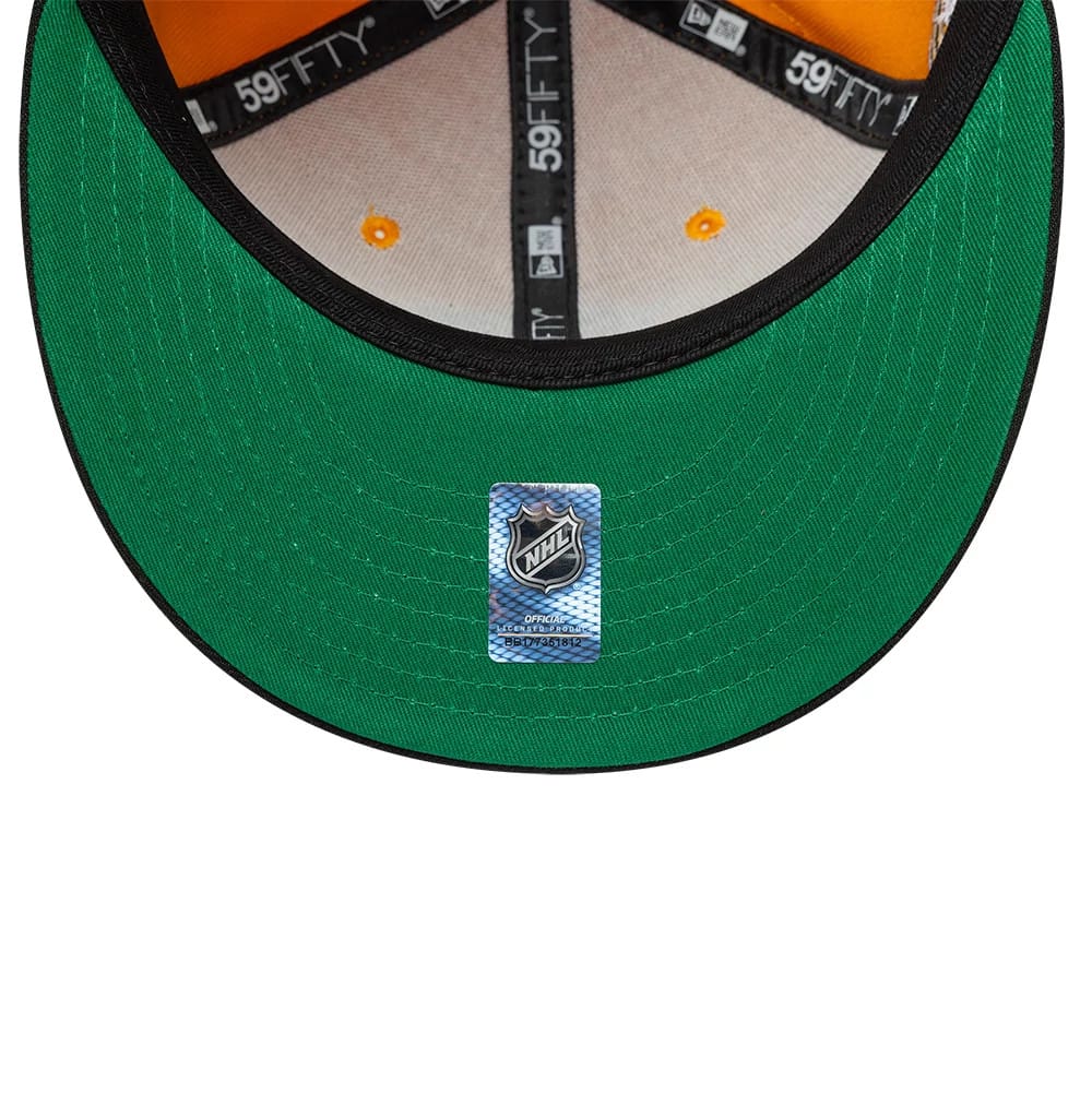 Pictured is this NHL Champions Pittsburgh Penguins 59FIFTY Fitted cap in yellow. 2
