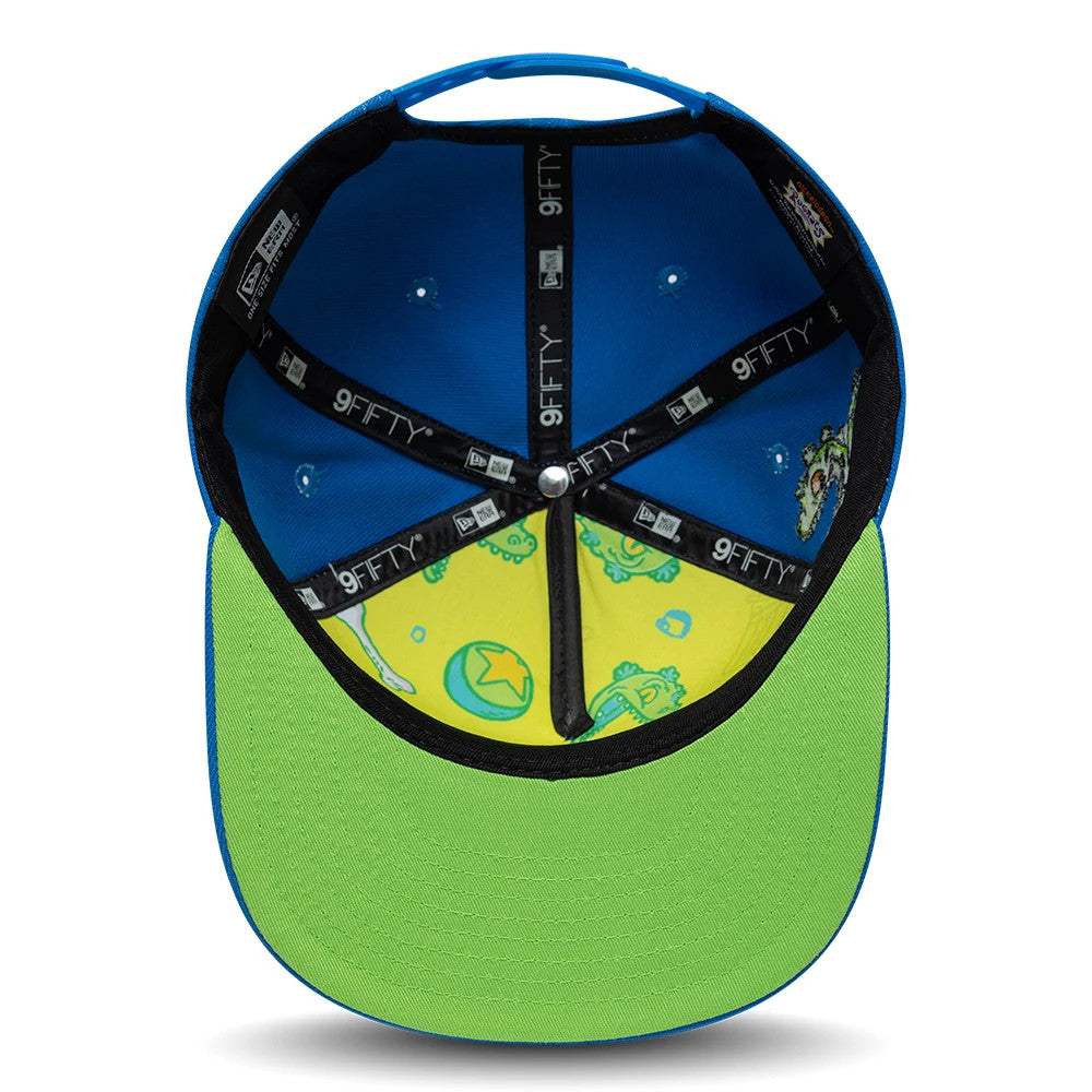 Pictured is this Rugrats Party In The Playpen 9FIFTY A-Frame Snapback cap in blue. 2