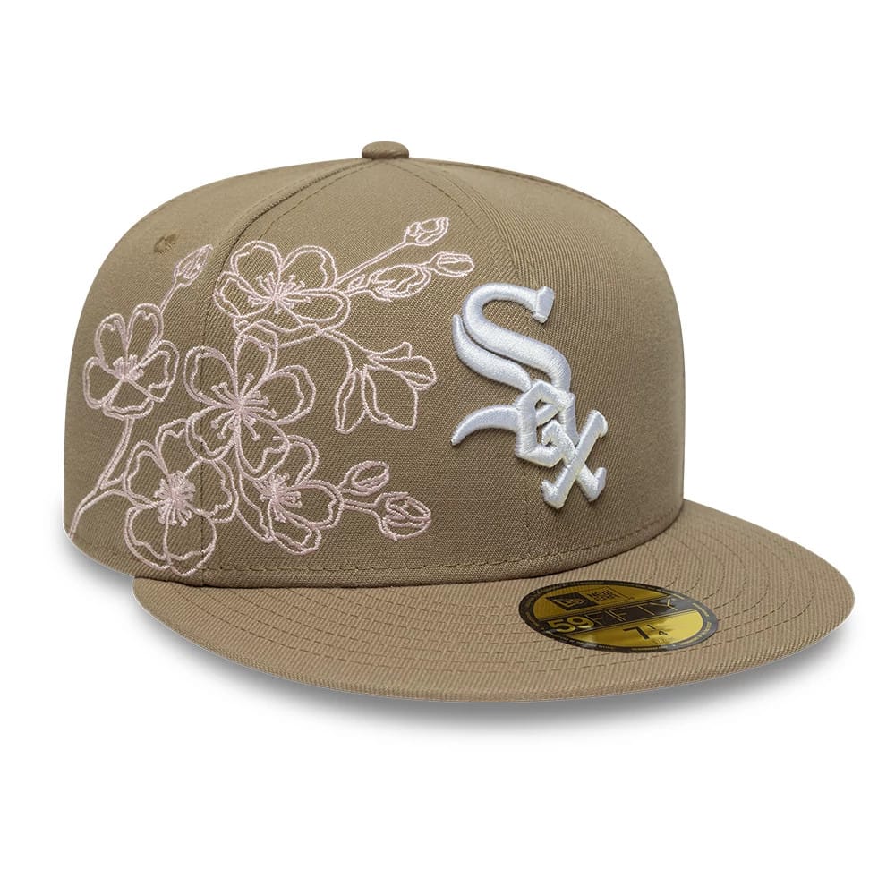 Pictured is this MLB Floral Outline Chicago White Sox 59FIFTY Fitted cap in beige. 1
