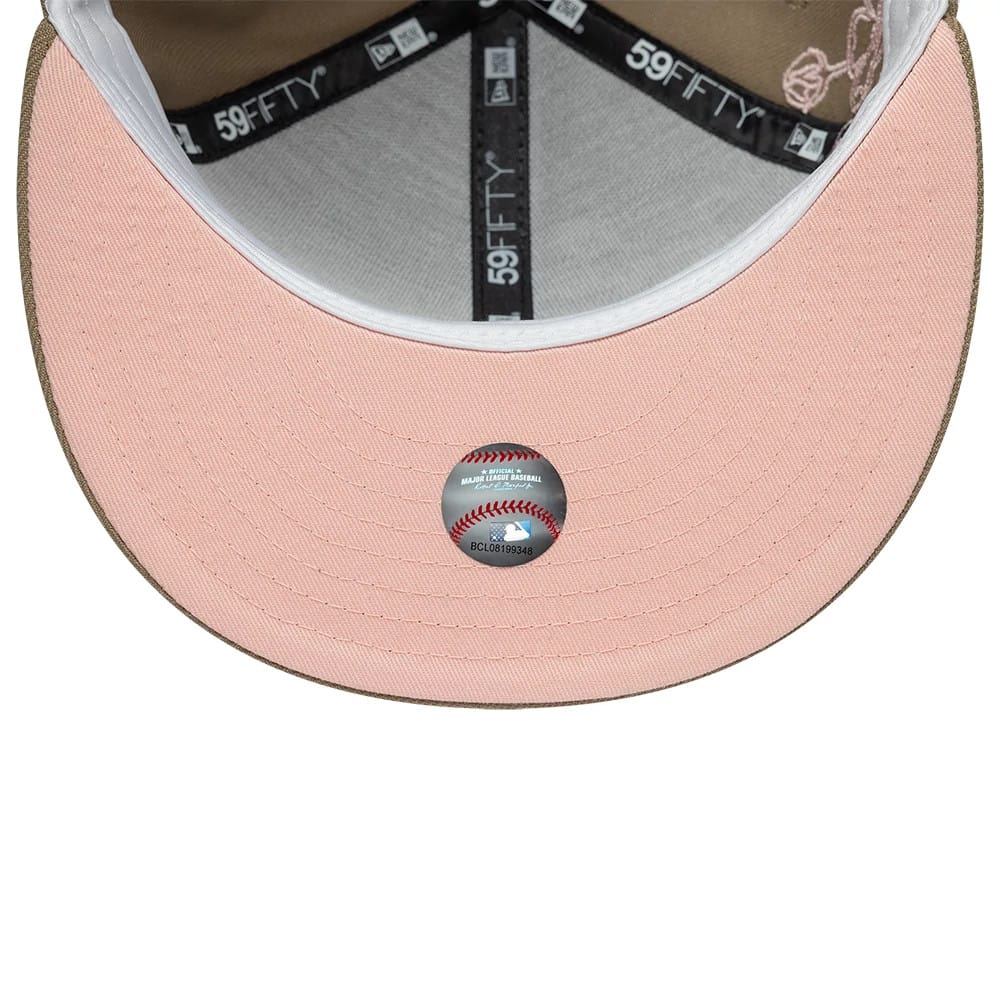 Pictured is this MLB Floral Outline Chicago White Sox 59FIFTY Fitted cap in beige. 2