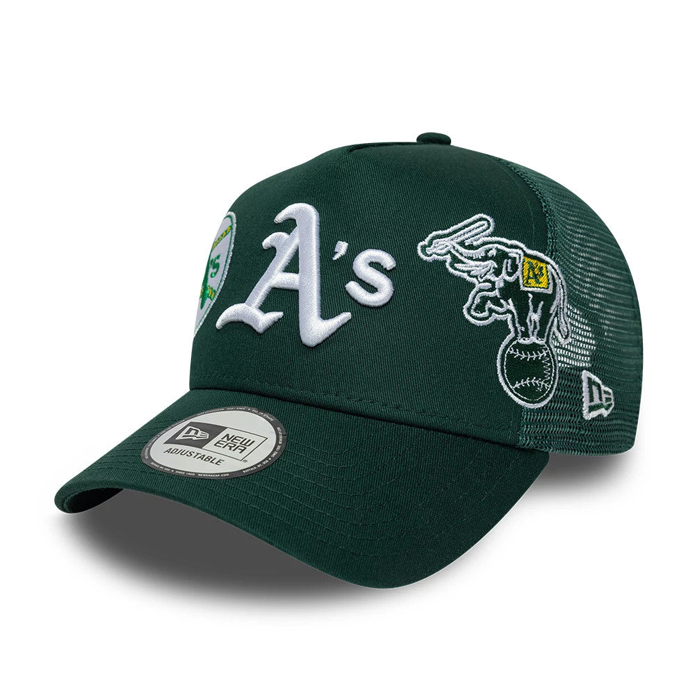 Athletics MLB Patch Dark Green New Era 9FORTY A-Frame Trucker Adjustable Cap, three-quarter view showing the white embroidered A's logo on the structured front panel, detailed elephant mascot on the side mesh.
