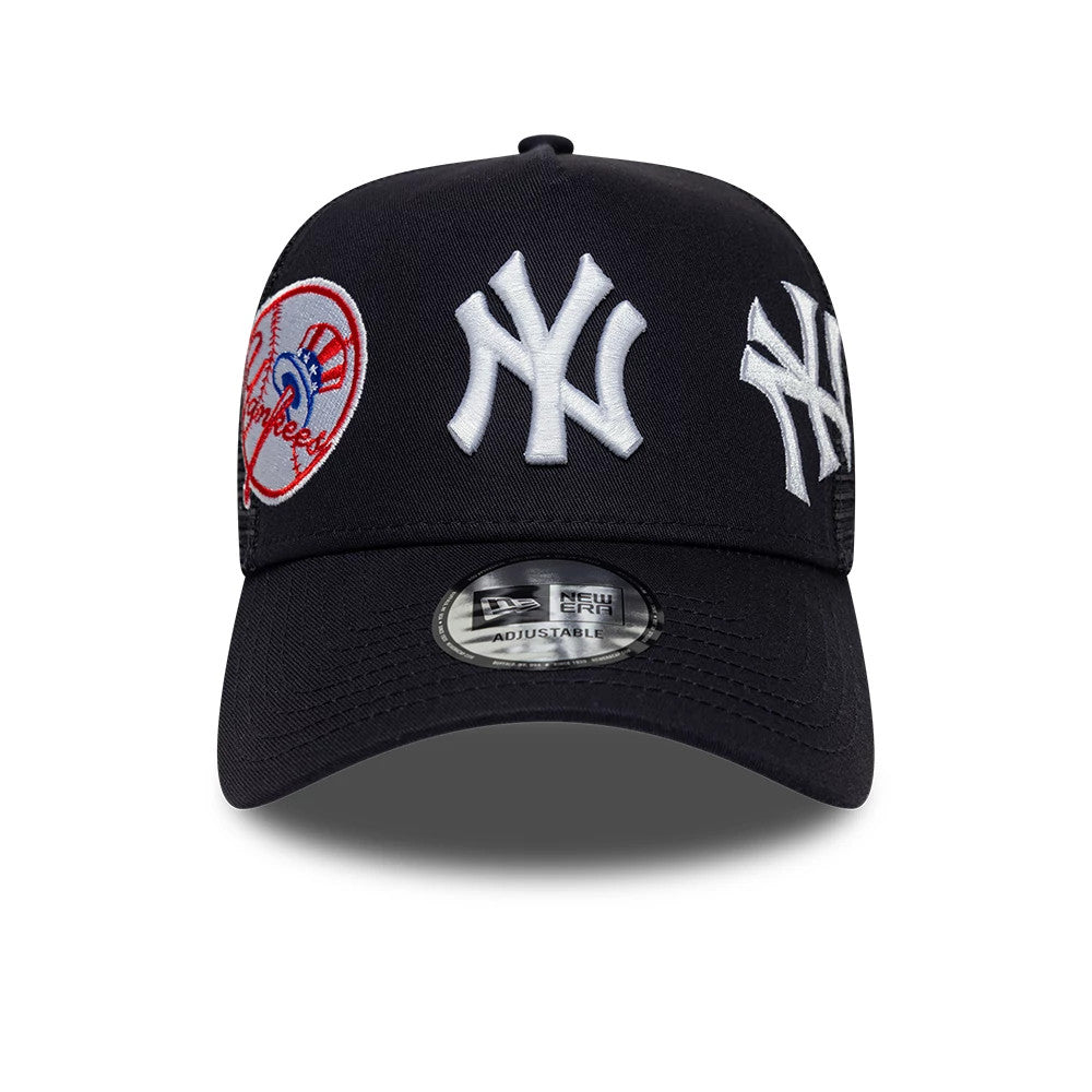 New York Yankees MLB Patch Navy New Era 9FORTY A-Frame Trucker Adjustable Cap, front view showing a raised white NY logo in the centre, a Yankees patch on the front panel, and a curved visor with a 9FORTY size sticker.