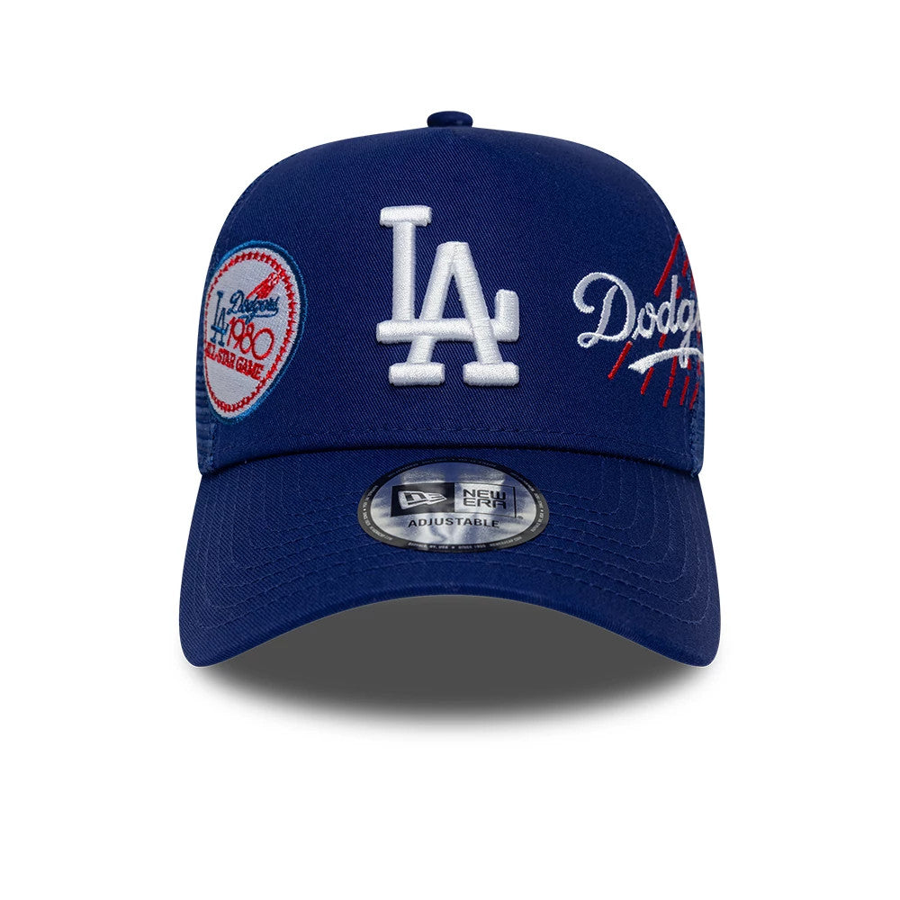 LA Dodgers MLB Patch Dark Blue New Era 9FORTY A-Frame Trucker Adjustable Cap, front view showing a raised white LA monogram logo on the front panel, Dodgers script on the right panel, and a New Era Adjustable size sticker on the curved visor.