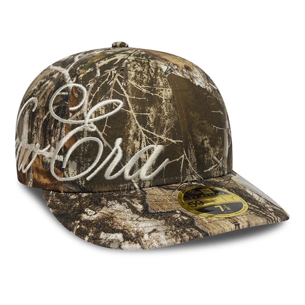 Pictured is this New Era Side Script Low Profile 59FIFTY Fitted cap in Realtree camo. 1