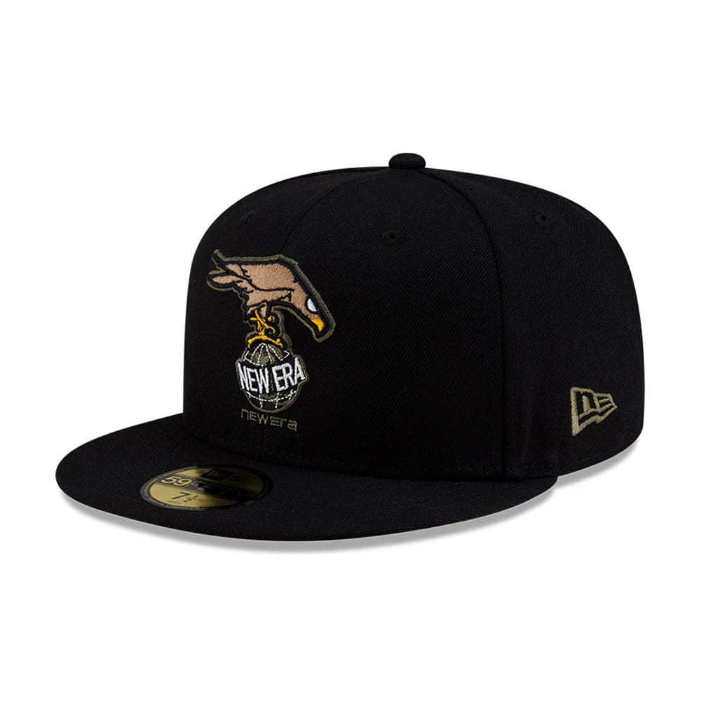 Roji Soccer Black New Era 59FIFTY Fitted Cap, three-quarter view showing a raised embroidered logo with a hand and globe on the front panel, a 59FIFTY size sticker on the flat black visor, and the New Era flag logo on the left side.