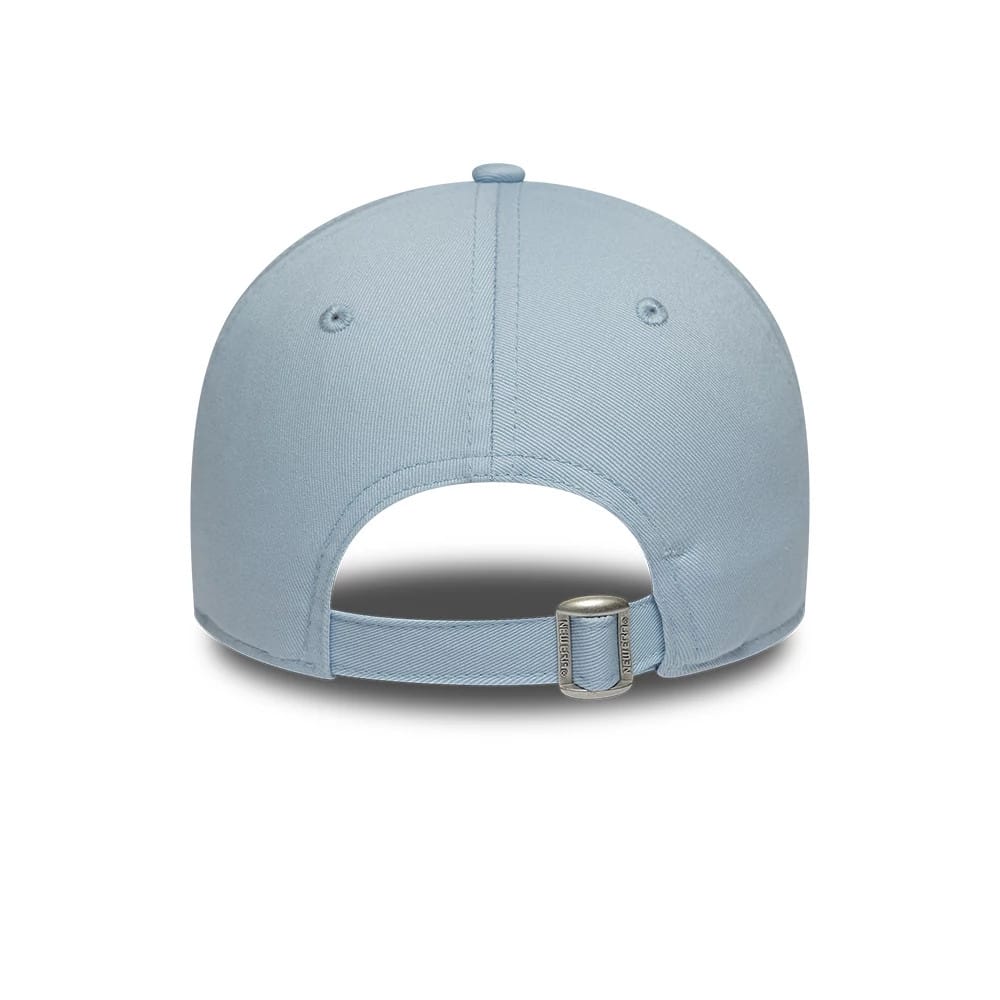 Lacoste X New Era Pastel Blue 9TWENTY Adjustable Cap, rear view showing the pastel blue crown with two embroidered eyelets, a fabric strap with a buckle for size adjustment, and additional stitching detail on the panels.