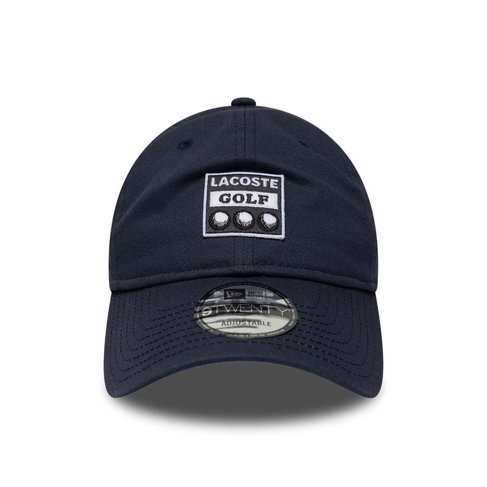 Pictured is this Lacoste X New Era 9TWENTY cap in dark blue. 2