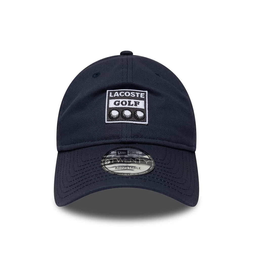 Pictured is this Lacoste X New Era 9TWENTY cap in dark blue. 2