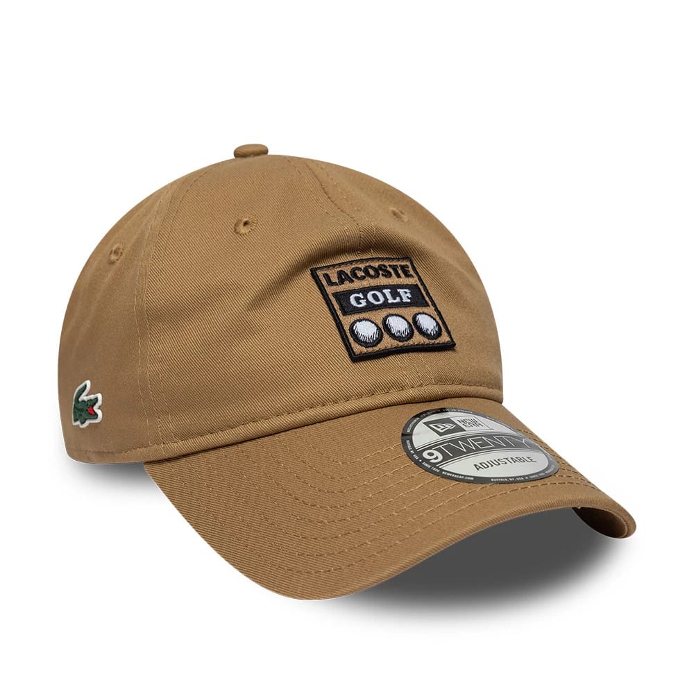 Pictured is this Lacoste X New Era 9TWENTY cap in beige. 1