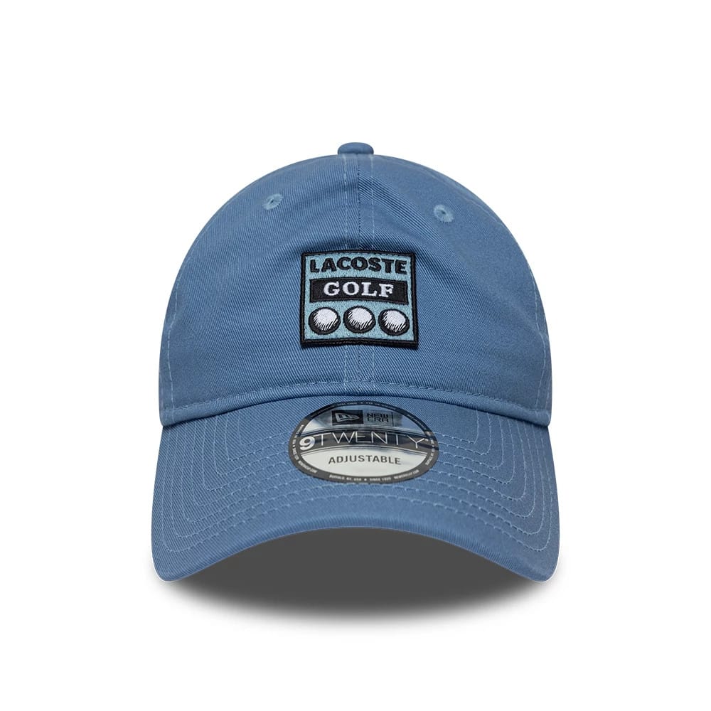 Pictured is this Lacoste X New Era 9TWENTY cap in blue. 2