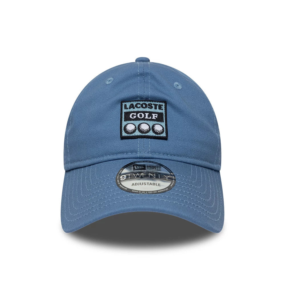 Pictured is this Lacoste X New Era 9TWENTY cap in blue. 2