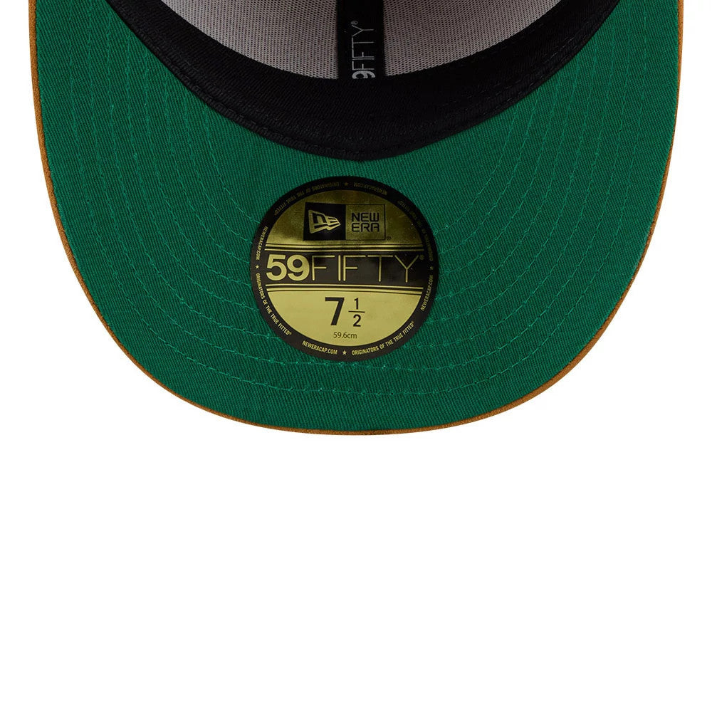 New York Mets Timberland X MLB Panama Tan New Era 59FIFTY Fitted Cap, inside view showing green undervisor with gold 59FIFTY size sticker, black sweatband, and light grey taping, creating a distinctive and interior look.