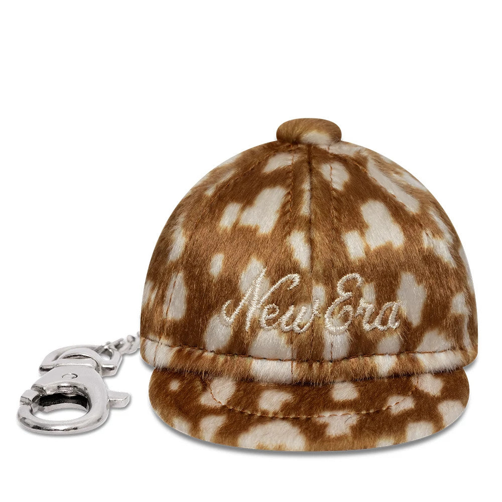 Pictured is this MLB Animal Mini Cap New Era Key Chain in Cow Print. 2