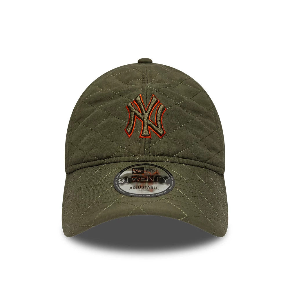 New York Yankees MLB Padded Outline Green New Era 9TWENTY Adjustable Cap, front view showing the orange embroidered NY logo on a quilted green crown, with a curved visor and a 9TWENTY size sticker.