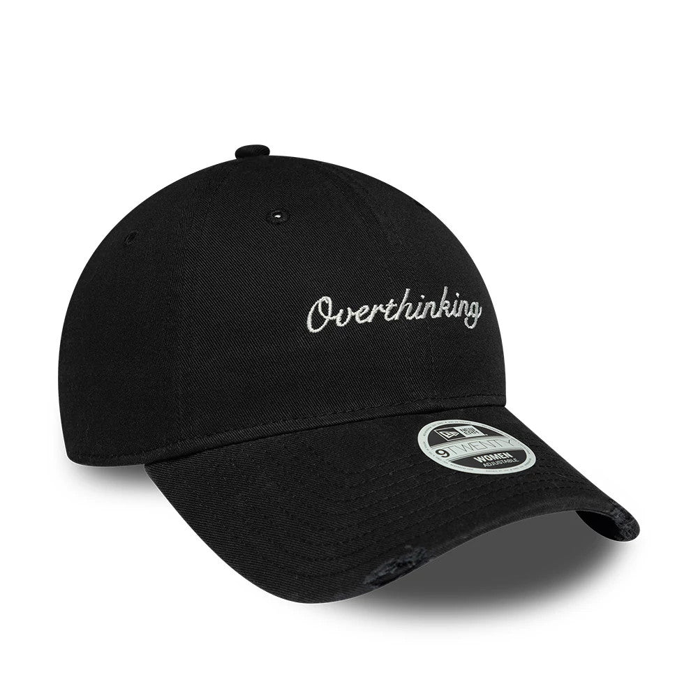 Womens New Era Slogan Black 9TWENTY Adjustable Cap, front view showing white embroidered Overthinking text on the black front panel, a curved black visor, and a 9TWENTY size sticker placed prominently on the visor.