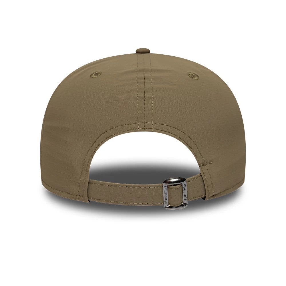 New Era Ripstop Sport Green 19TWENTY Adjustable Cap, rear view showing an unstructured crown with a green fabric, embroidered eyelets, and an adjustable strap with a buckle for custom fitting at the back.