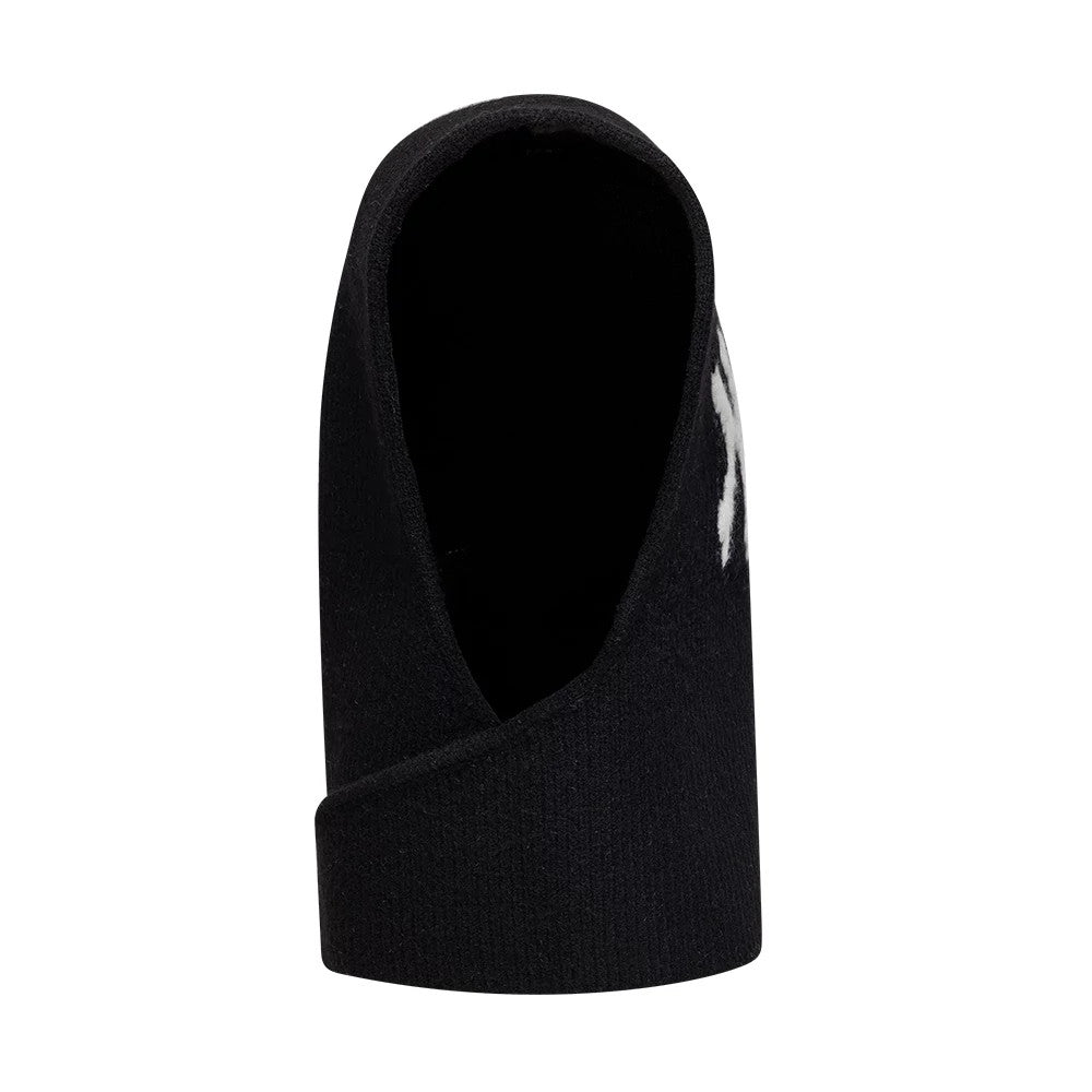 New Era New York Yankees Womens MLB Knitted Black Balaclava Hat, side view showing the balaclava's black knitted texture with curved open face design, white team logo on the side, and a snug fit around the neck.