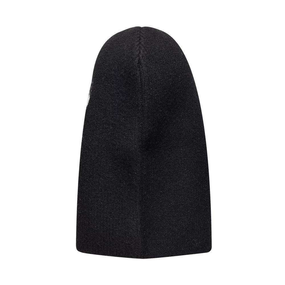 New Era New York Yankees Womens MLB Knitted Black Balaclava Hat, side view showing the seamless black knitted texture, elongated shape with a pointed top, and stitch along the vertical seam.