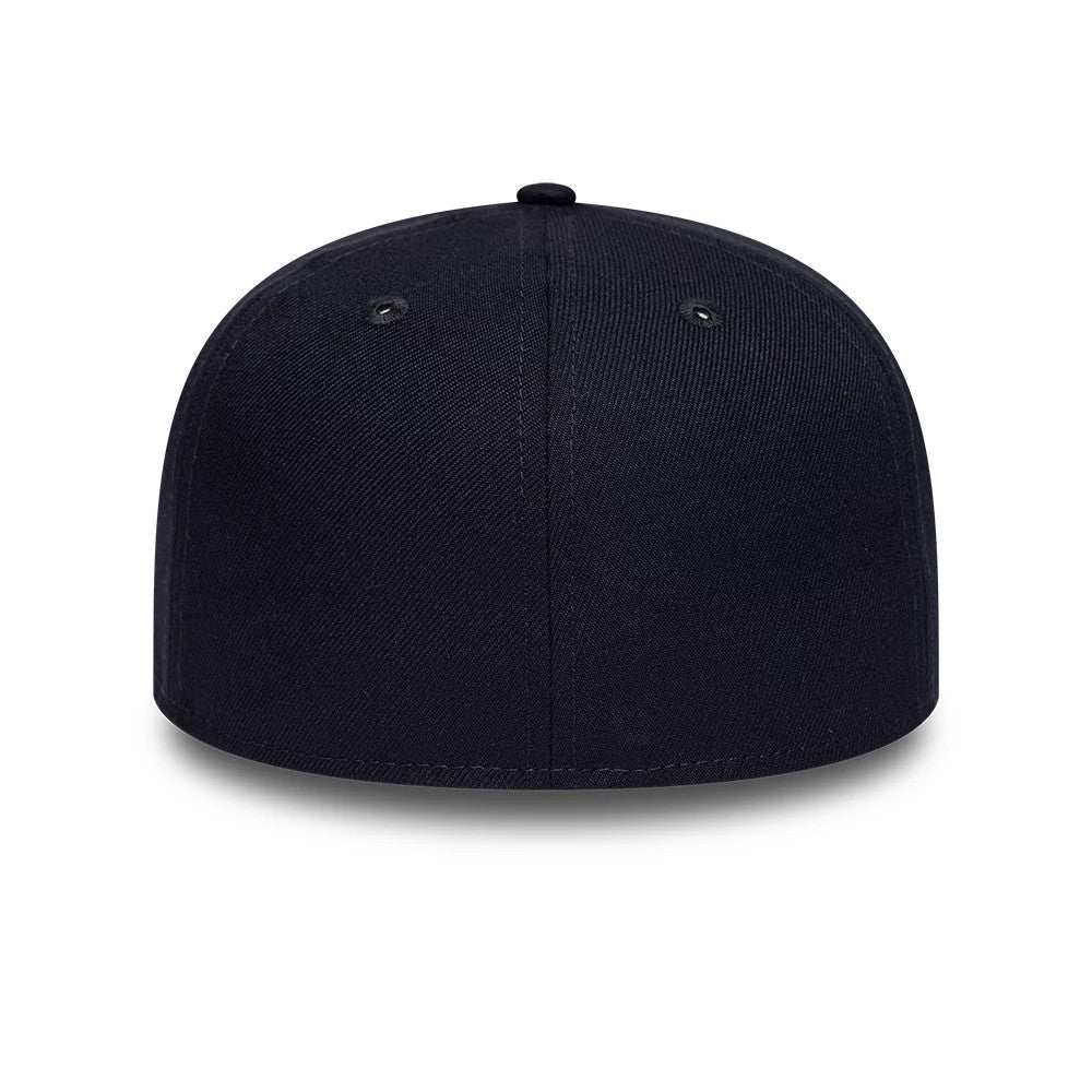 New Era Gem Patch Distress Navy 59FIFTY Fitted Cap, rear view showing a plain navy back panel with navy embroidered eyelets and no back logo, highlighting the curve and structured shape of the fitted crown.